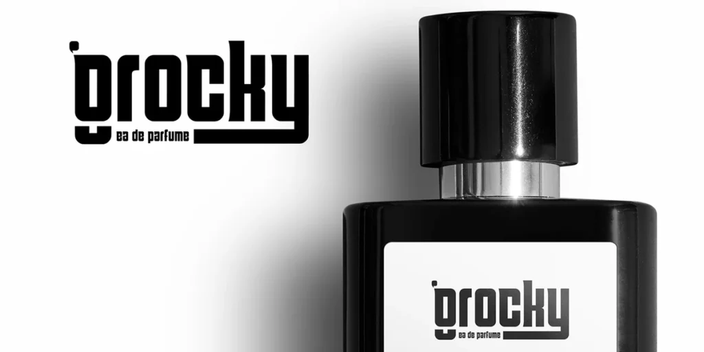 Bold clothing brand typography logo featuring oversized condensed uppercase lettering, custom letterforms, and a striking black and orange design.